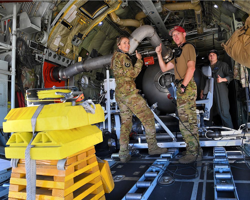 Aircrew inside airplane.