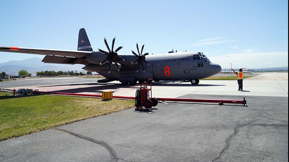 C-130 aircraft on tarmac.