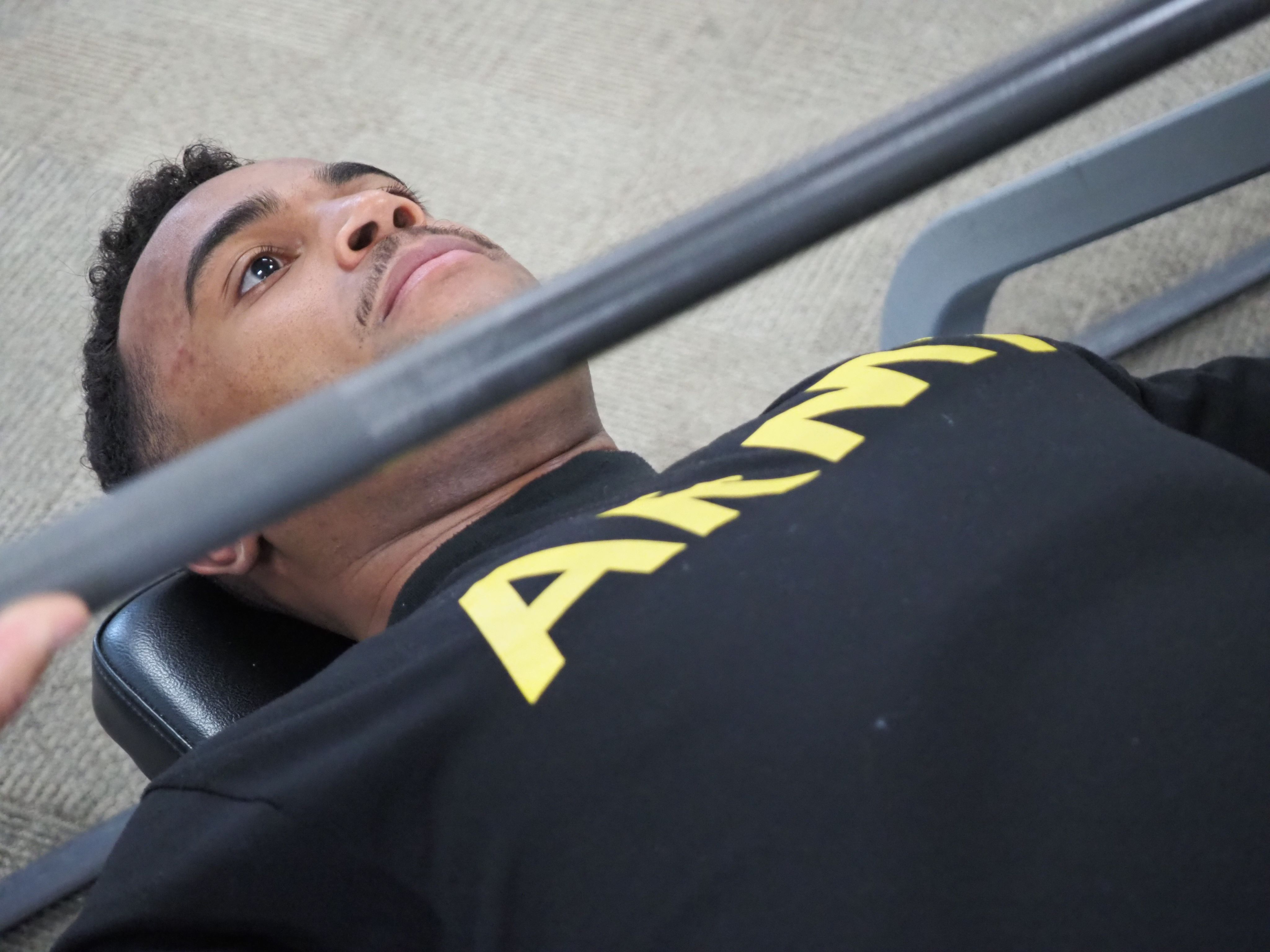 soldier lifts a barbell