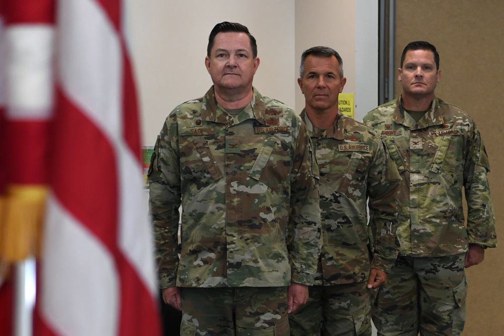 Members of the California Air National Guard’s 195th Wing leadership stand at attention during the playing of the national anthem at the 195th Operations Group change of command ceremony, June 10, 2021, at Sepulveda Air National Guard Station, Van Nuys, California. The 195th Wing is composed of a diverse set of squadrons spread throughout the state of California with missions spanning space operations, cyberspace protection, and combat communications. (U.S. Air Force photo by Senior Airman Melanie L. Nolen)