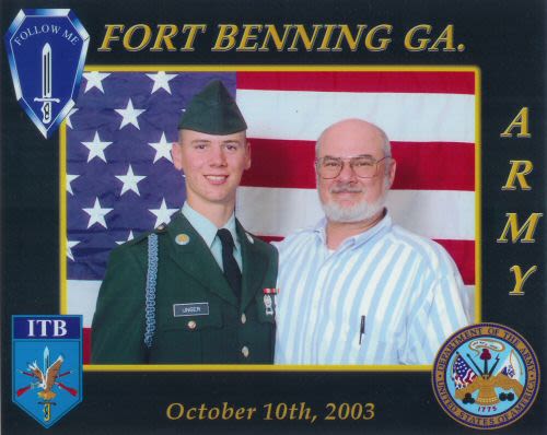 U.S. Army Spc. Daniel Unger, left, and father, Marc Unger, right, pose in photo after graduation from infantry training.