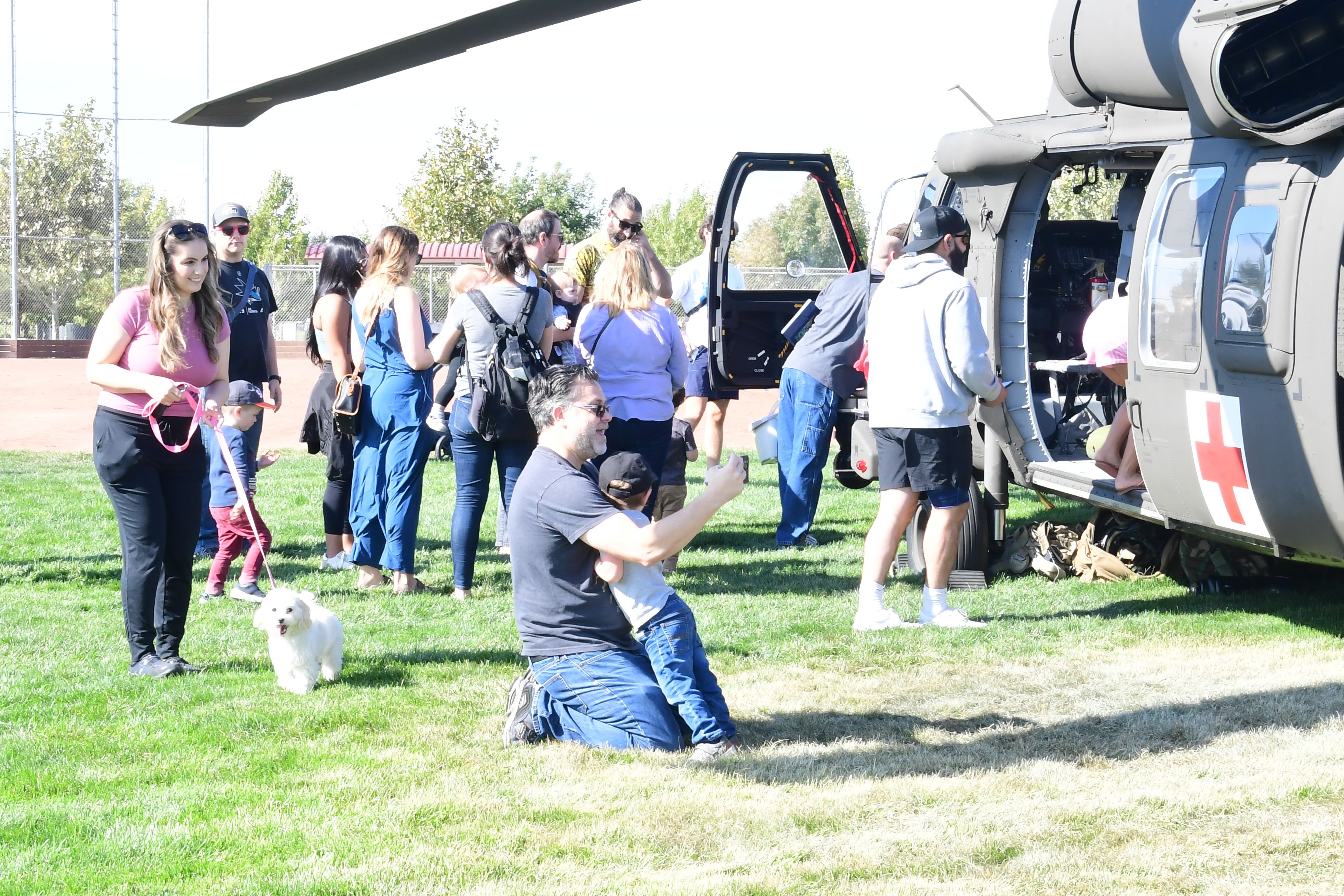 Spectators gather around aircraft