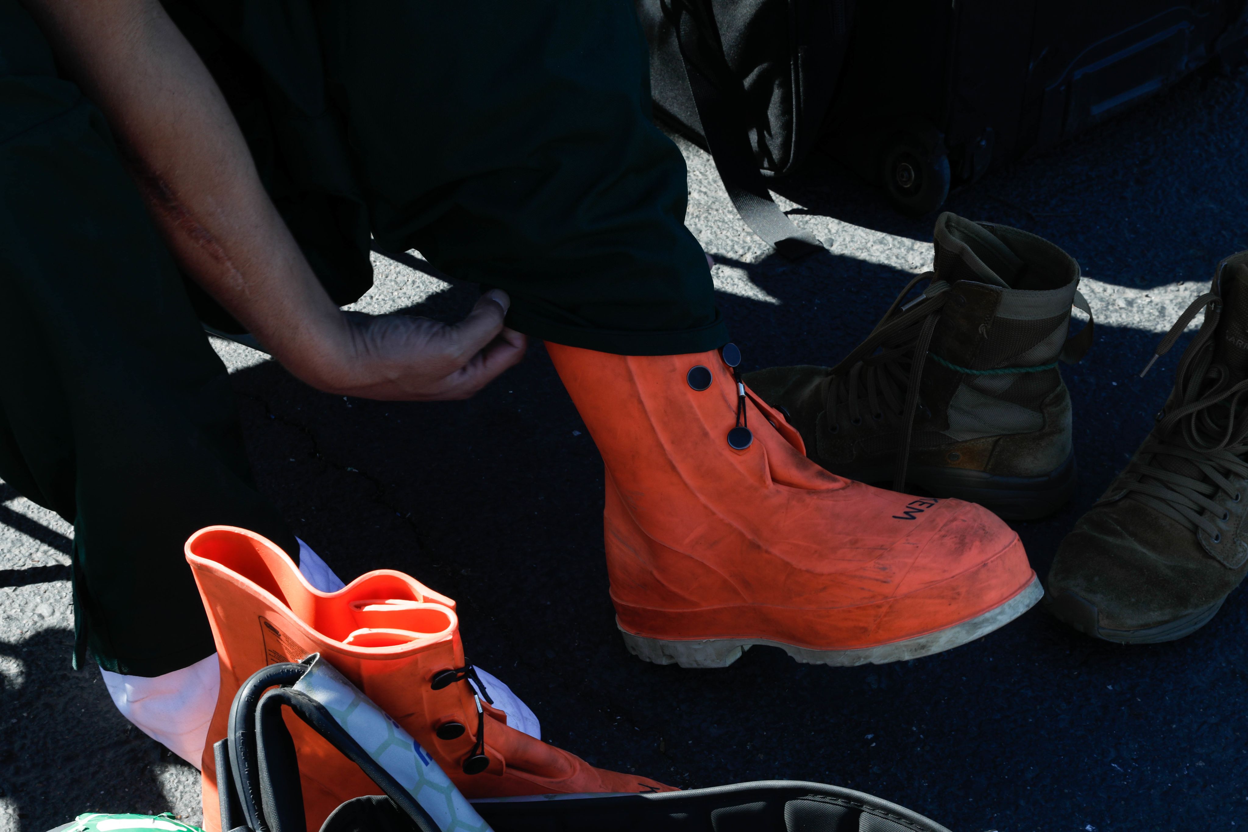 Orange hazmat boots.