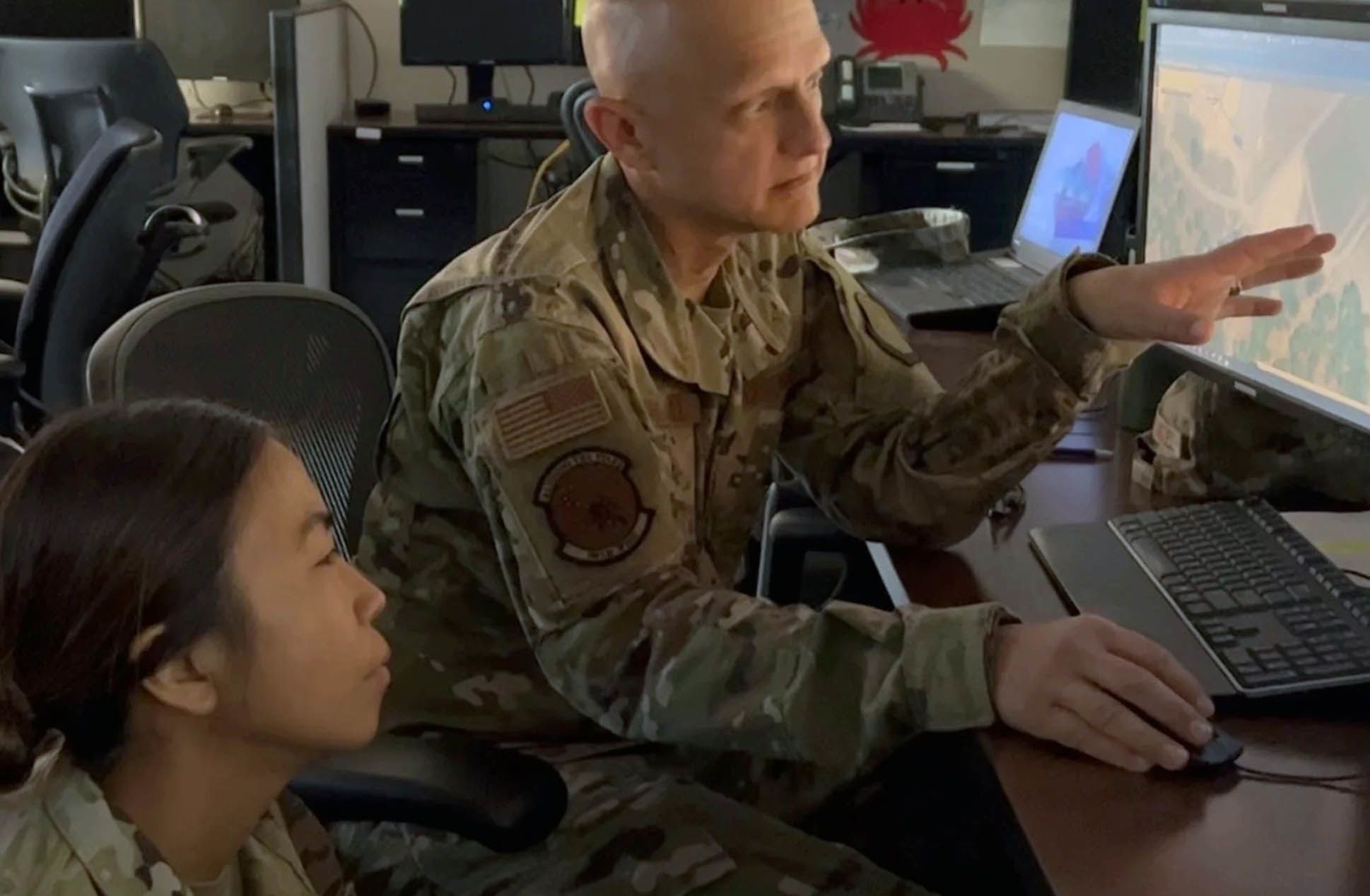 Servicemembers at computer