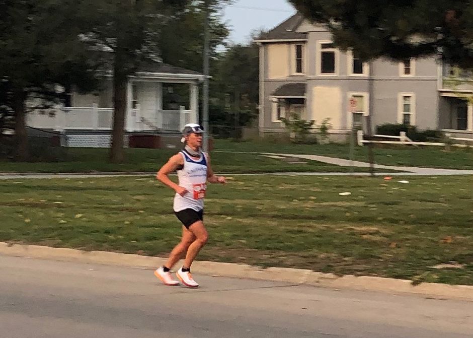 Female runner on street.