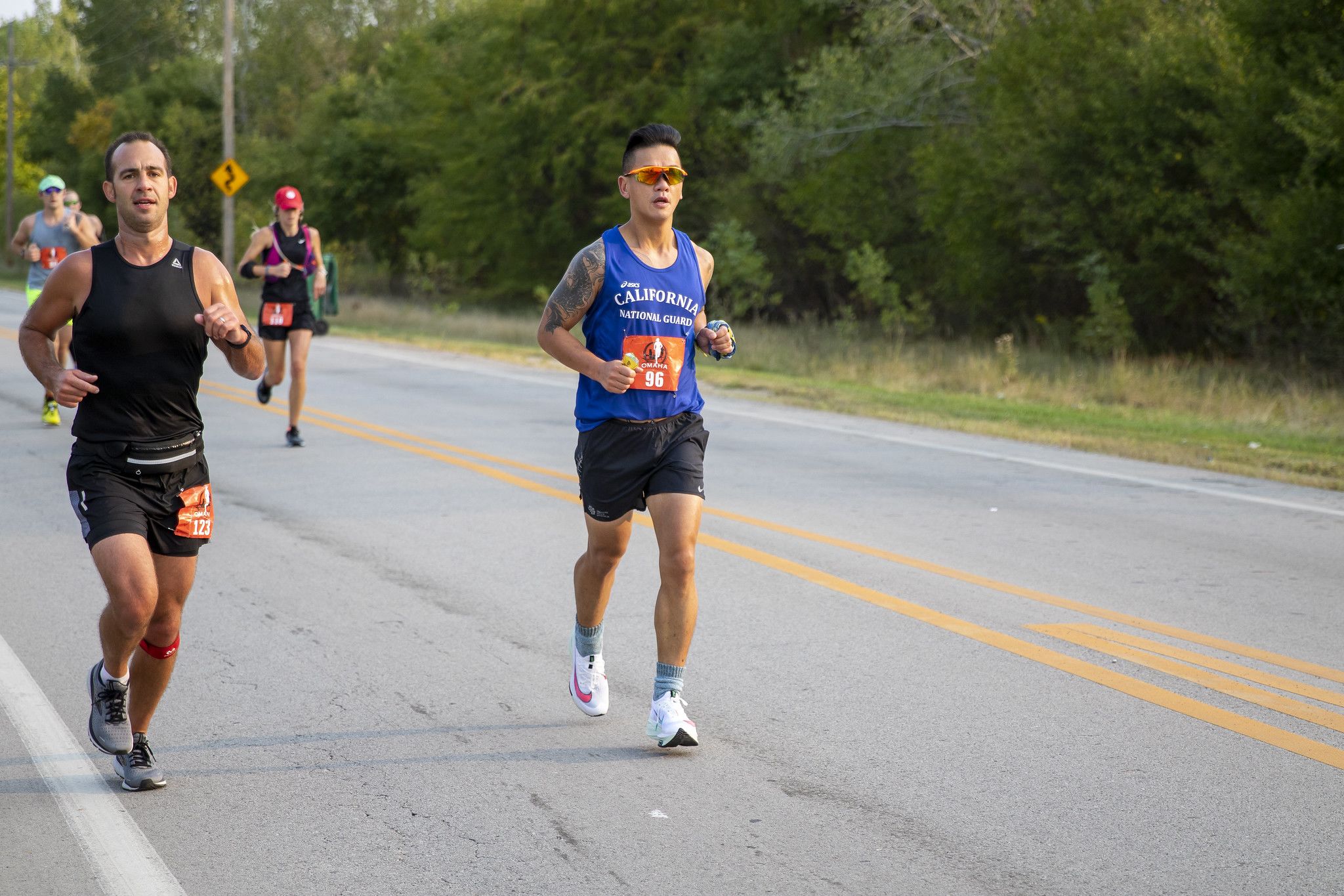 Marathon runner on road.