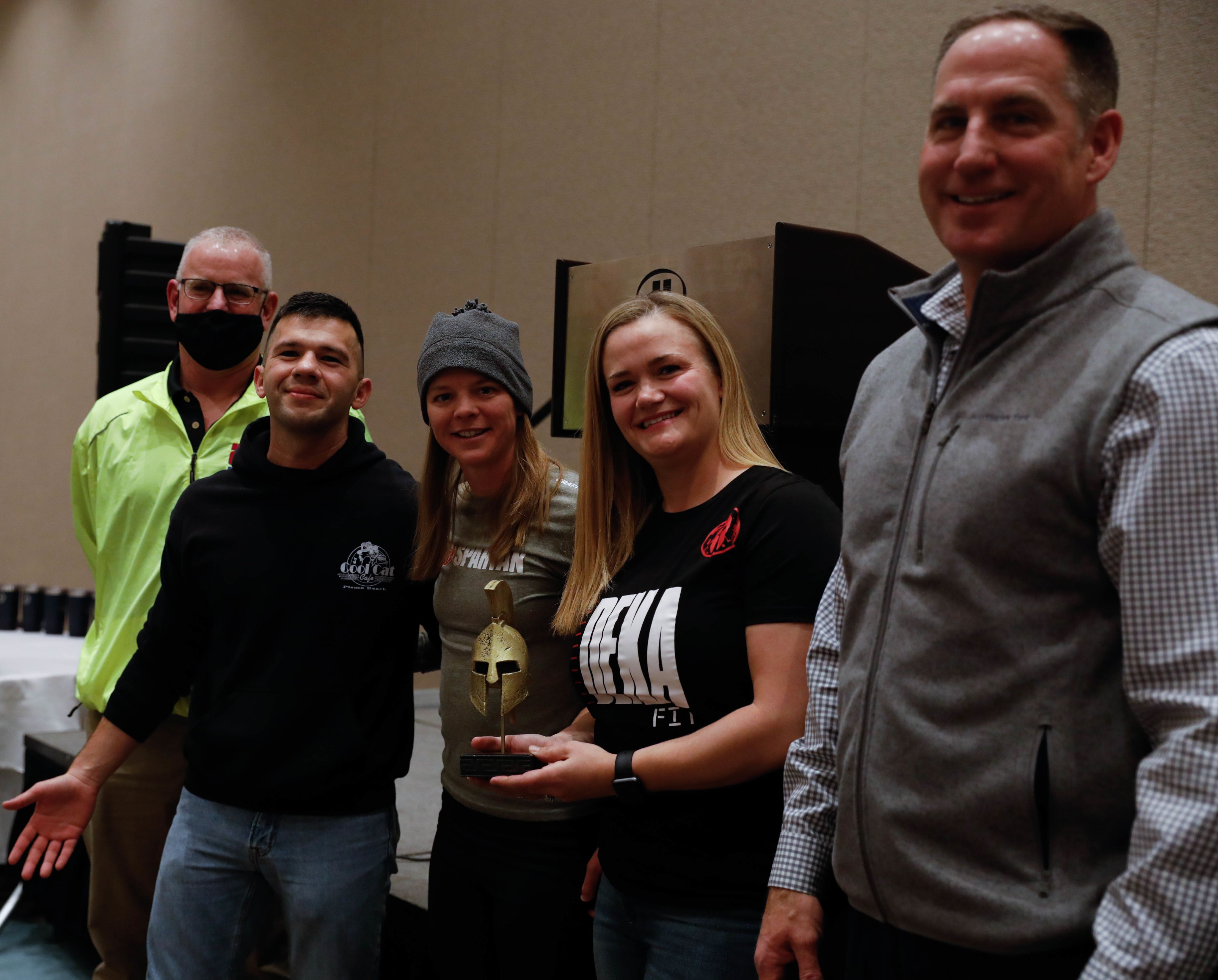 Group photo with trophy.
