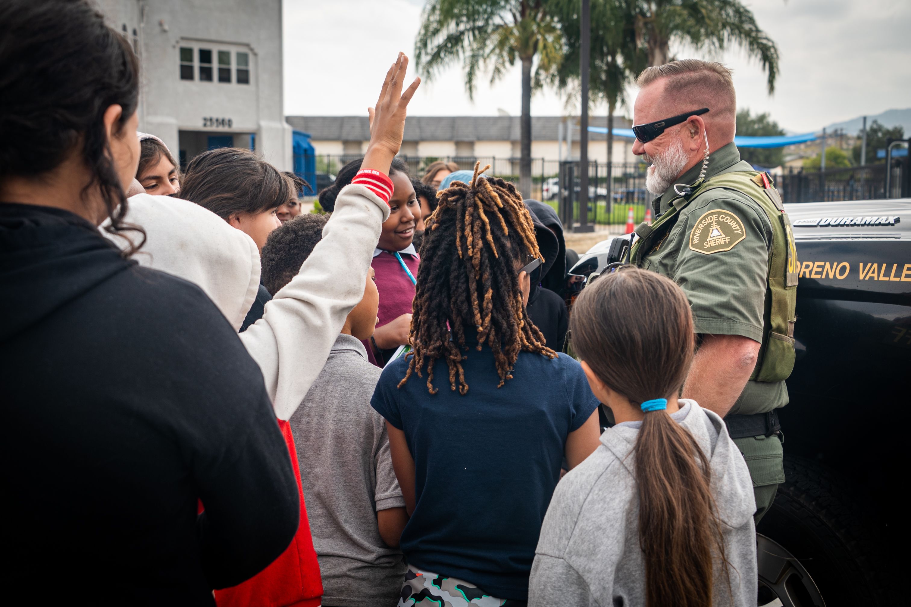 Police officer with children