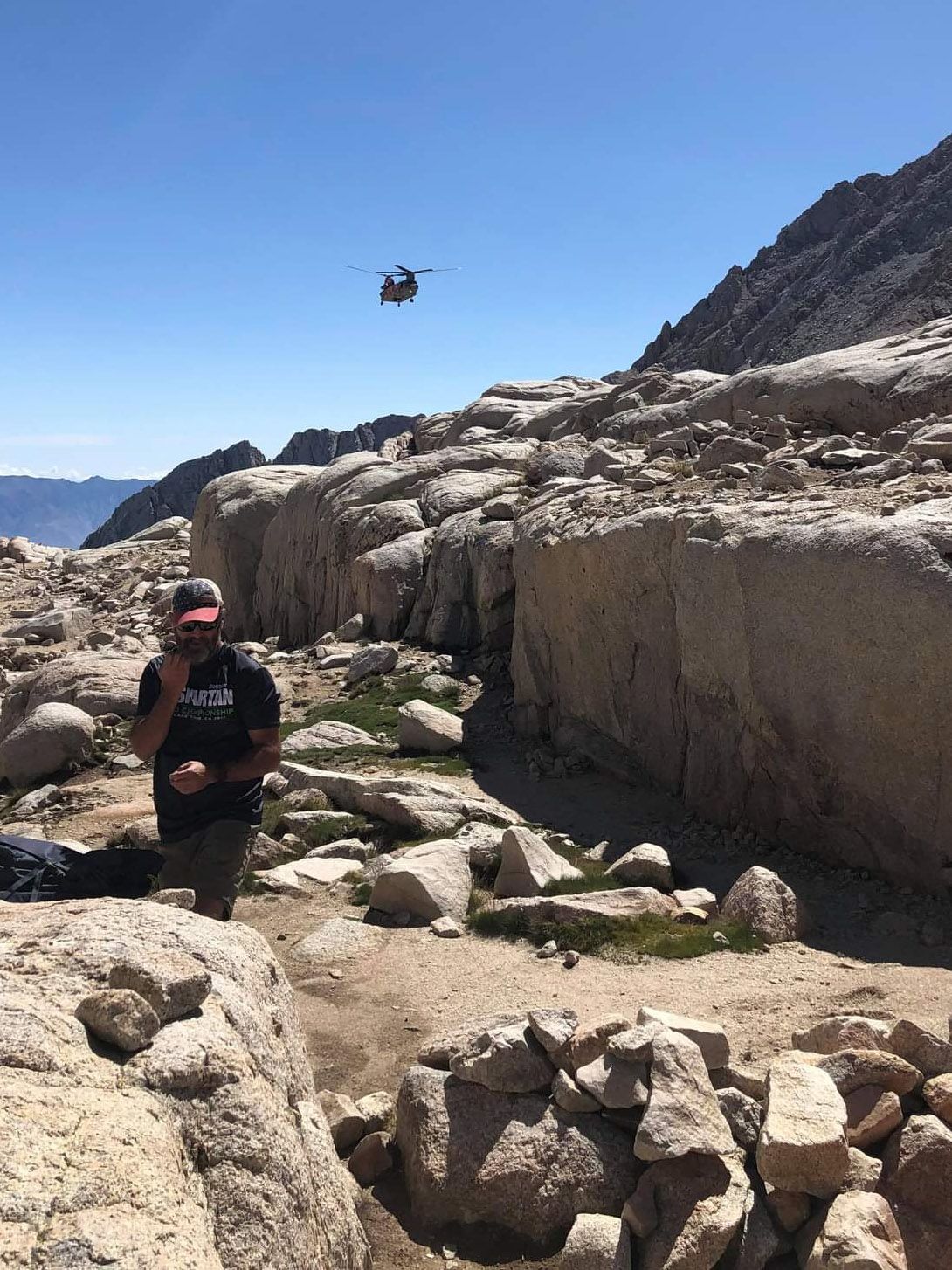 Helicpter flies over Mt. Whitney.