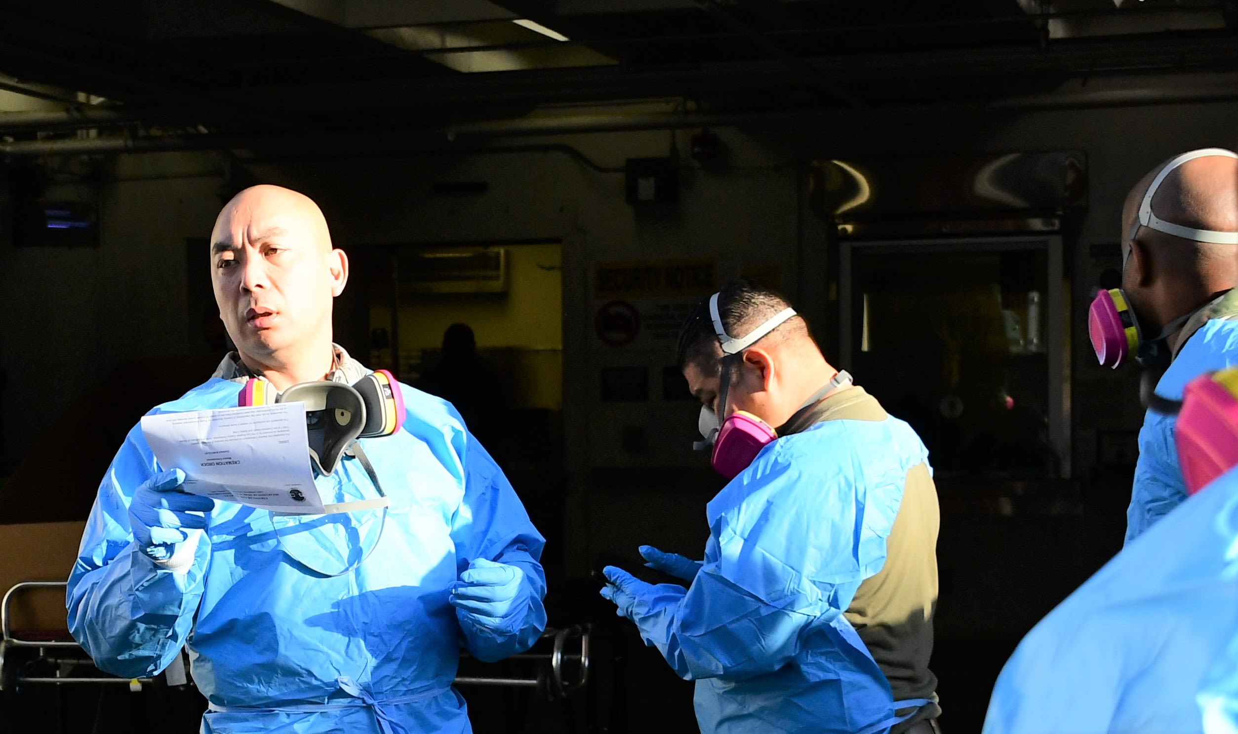 Airman speaks with team about the day's operations.
