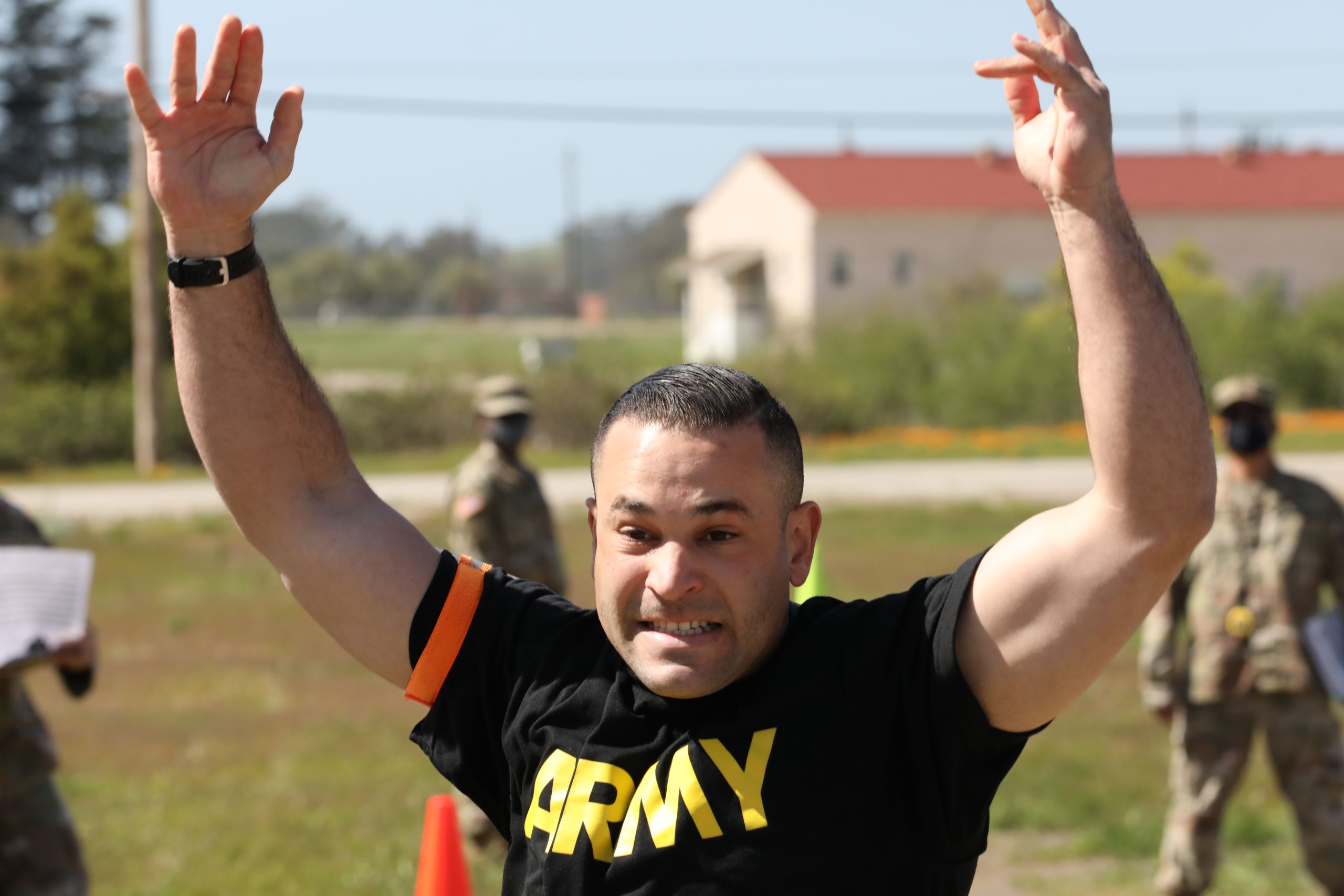 Photo of Cal Guardsman tossing medicine ball
