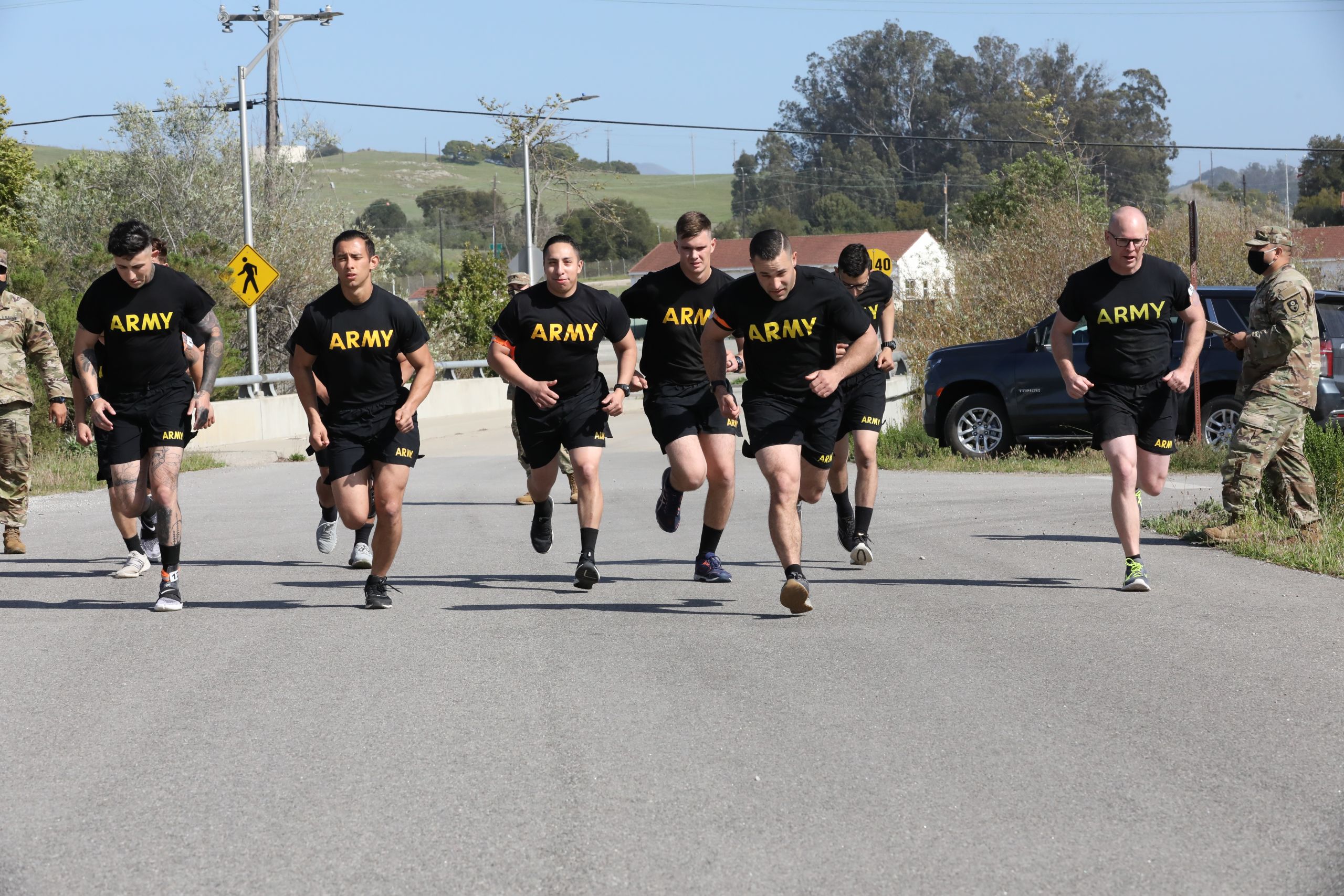 Photo of Cal Guardsmen at start of 2-mile run.