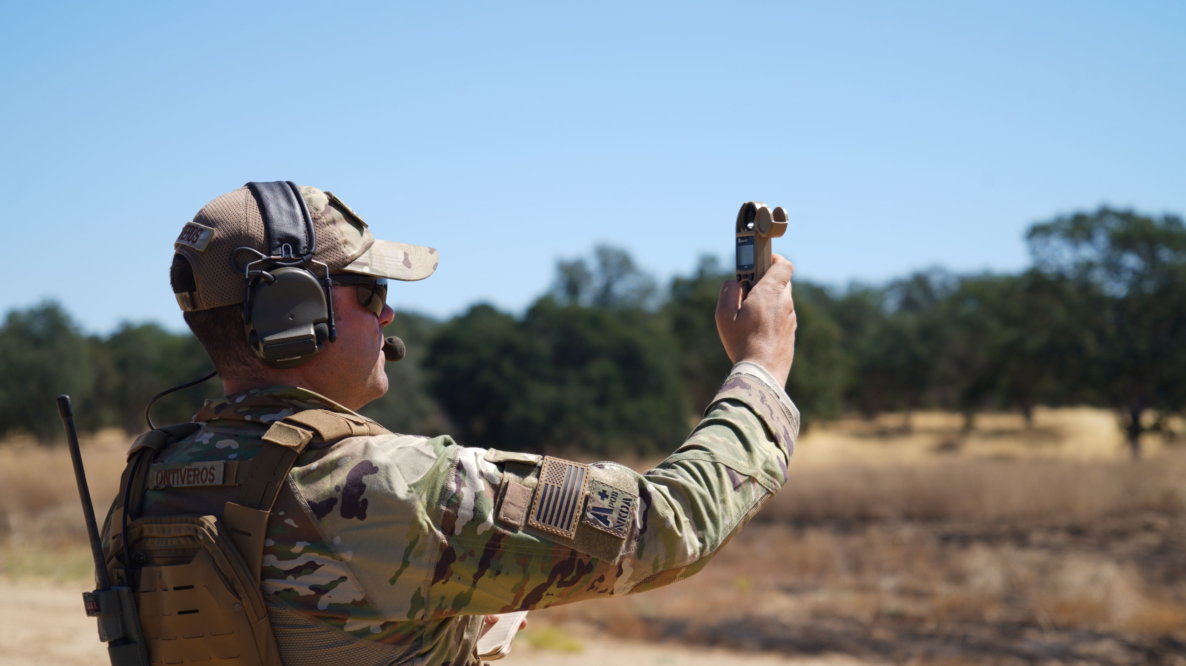 Airman takes a wind speed reading
