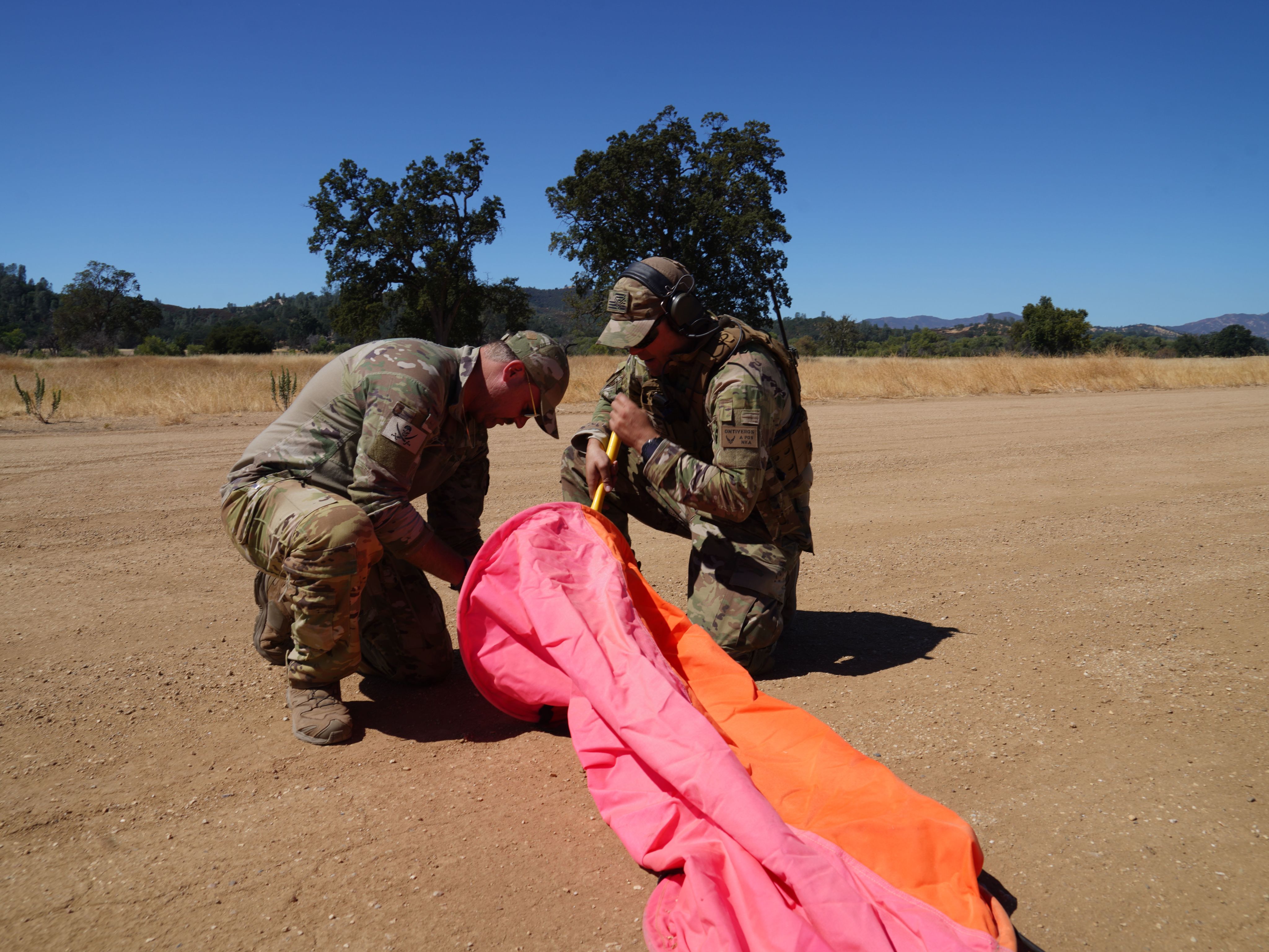Airmen set up an air drop marker