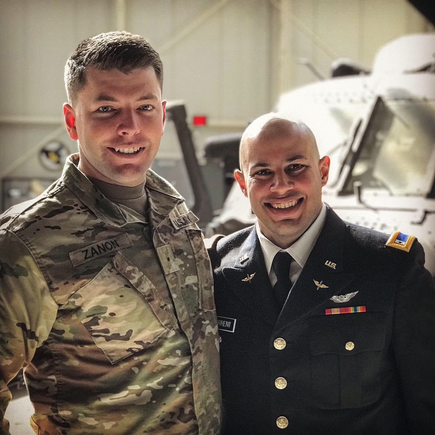 Two Soldiers pose for a photo together