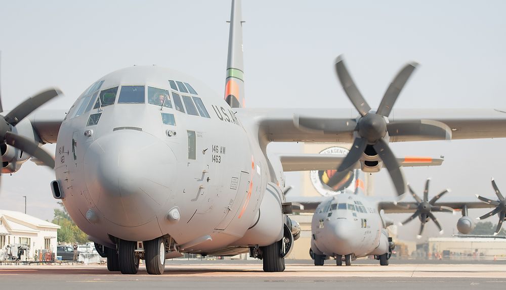 Two propeller aircraft.