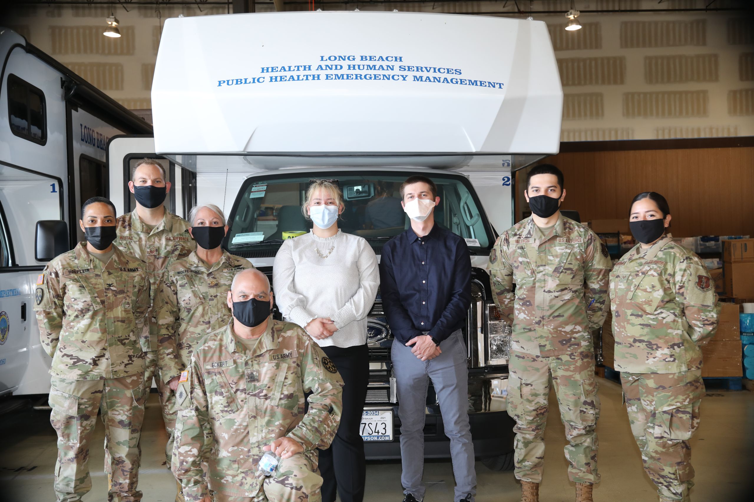 Photo of Cal Guardsmen with civilians