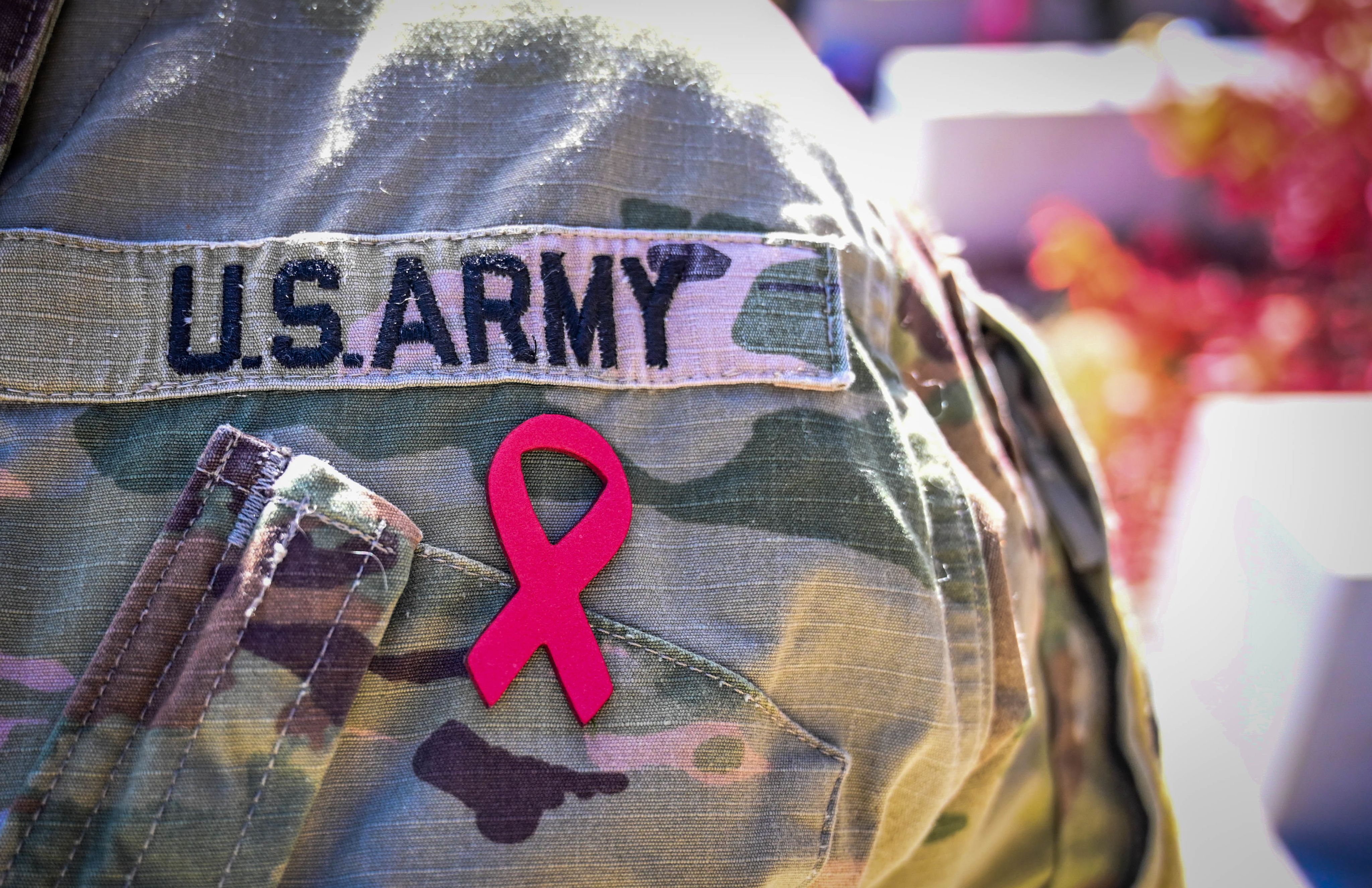 Front U.S. Army uniform with a Red Ribbon Pin on it