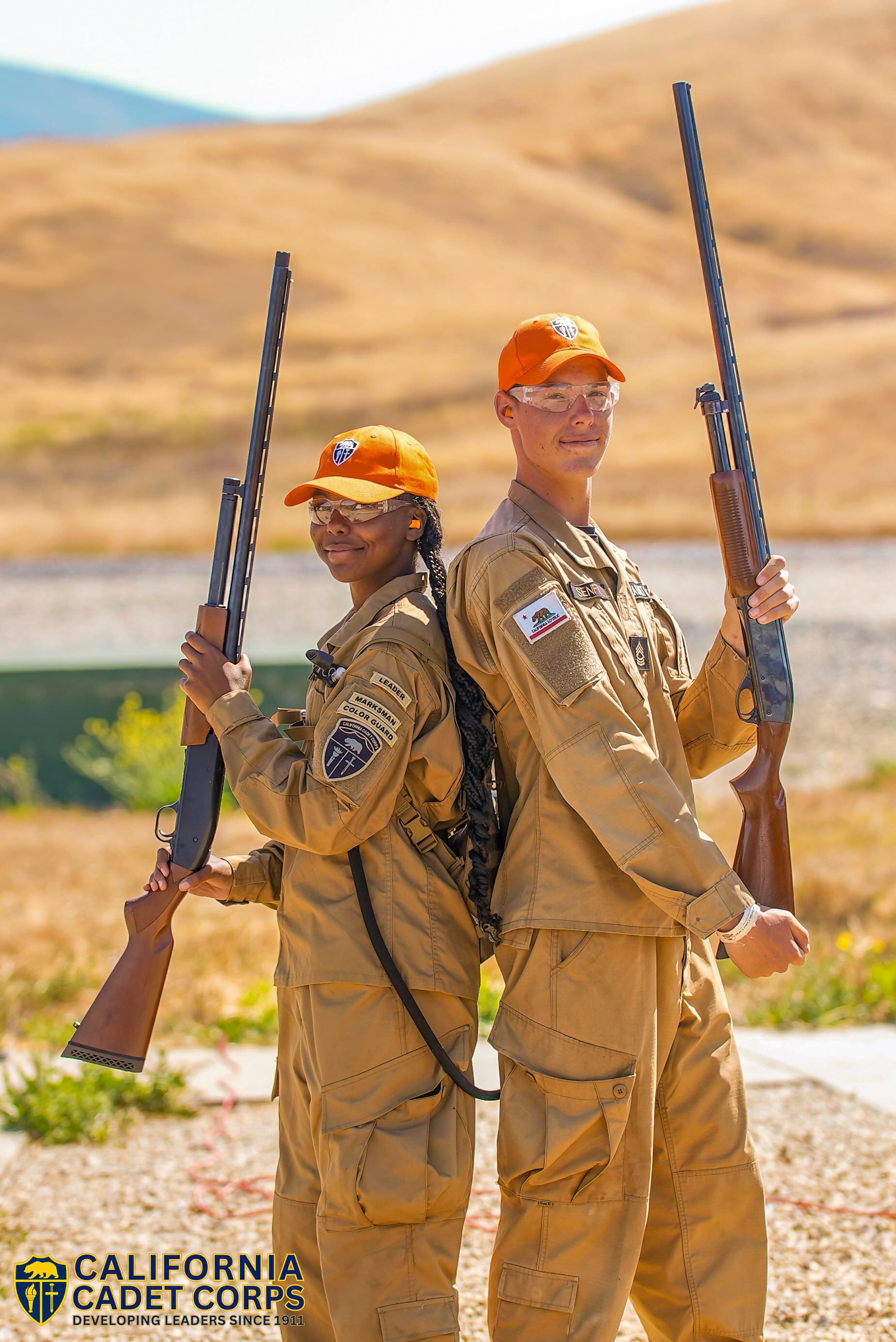Two CACC cadets in the Marksmanship unit pose on the trap range. 
