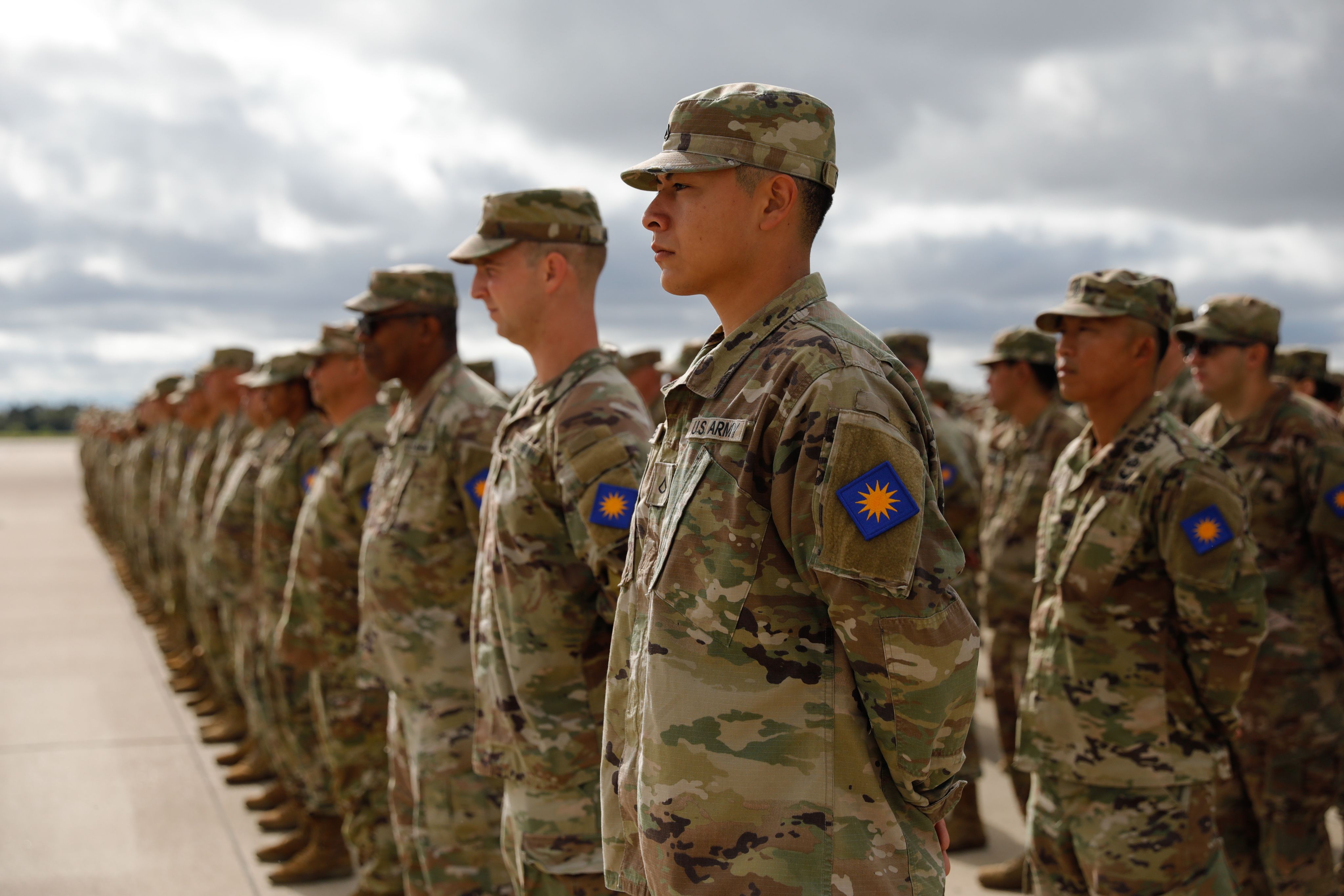 Soldiers stand in formation